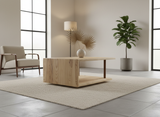 The Lockwood Scandinavian style solid ash waterfall coffee table styled in a modern, brightly lit living room.